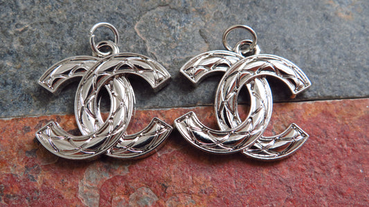 Bundle Of 2 Chanel CC Silver Tone Embossed Stamped Zipper Pull Charms!