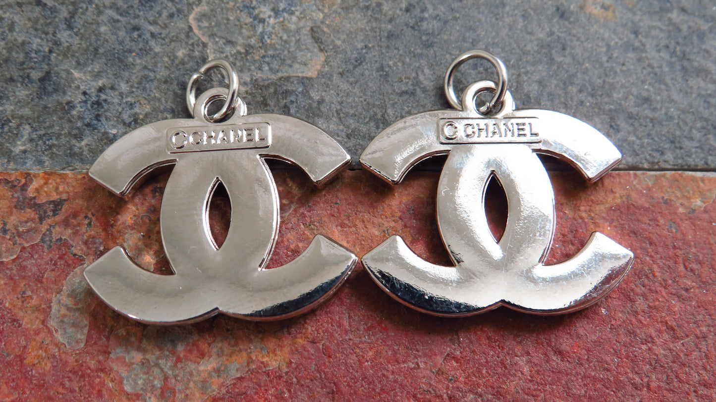 Bundle Of 2 Chanel CC Silver Tone Embossed Stamped Zipper Pull Charms!