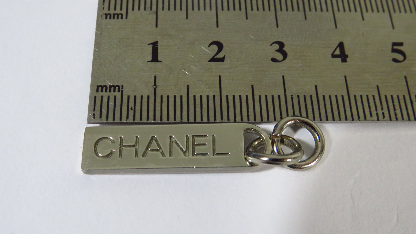 Vintage 90's Chanel Chrome Engraved Zipper!
