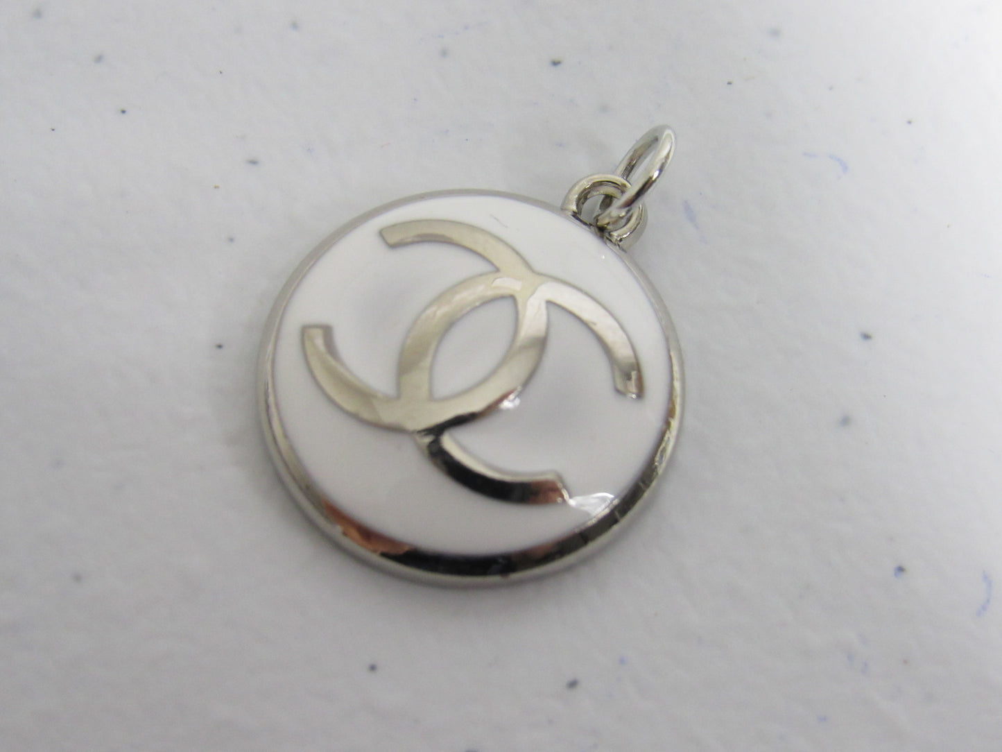 Chanel Chrome And White Concave Zipper Pull Charm!