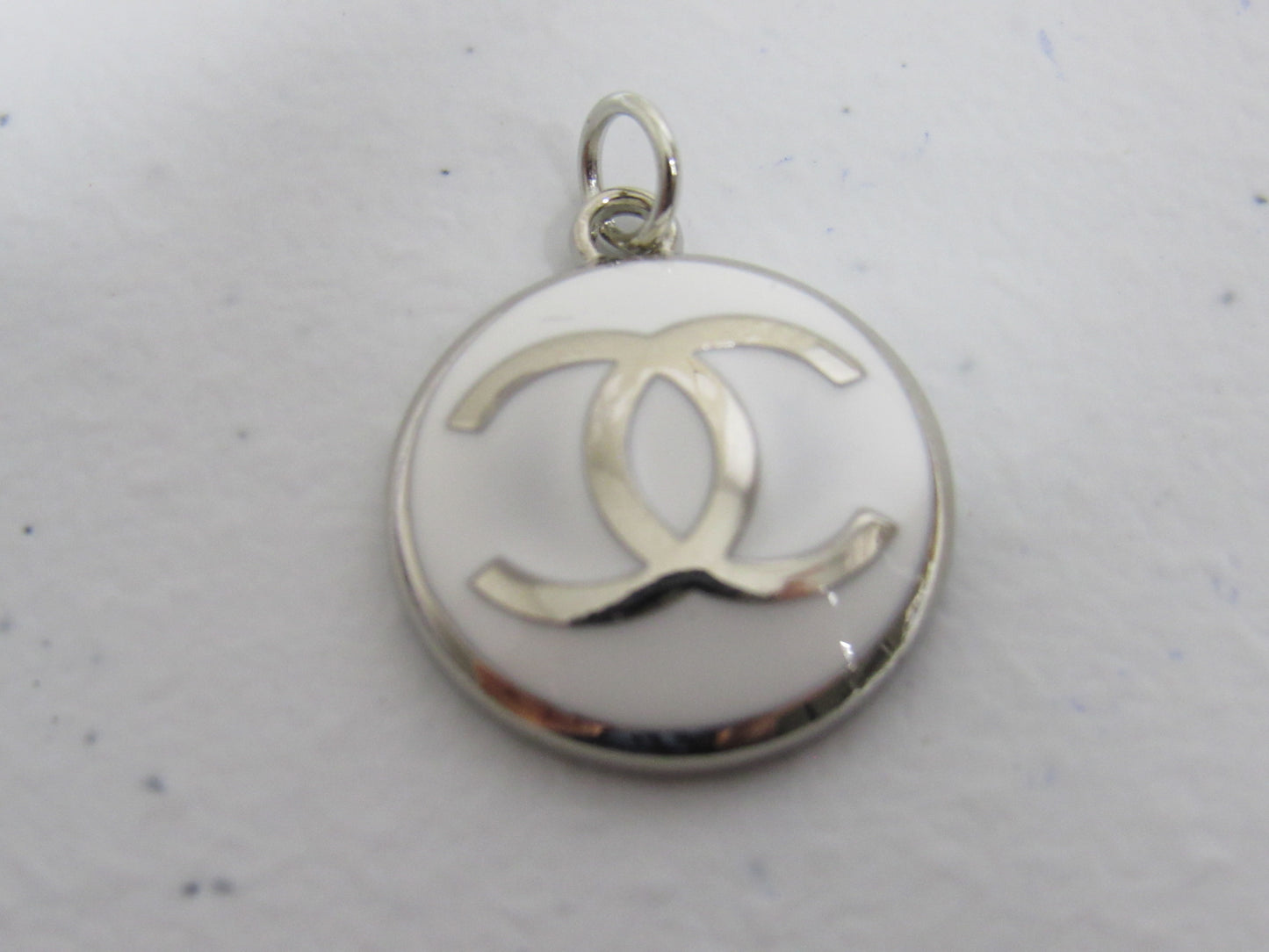 Chanel Chrome And White Concave Zipper Pull Charm!