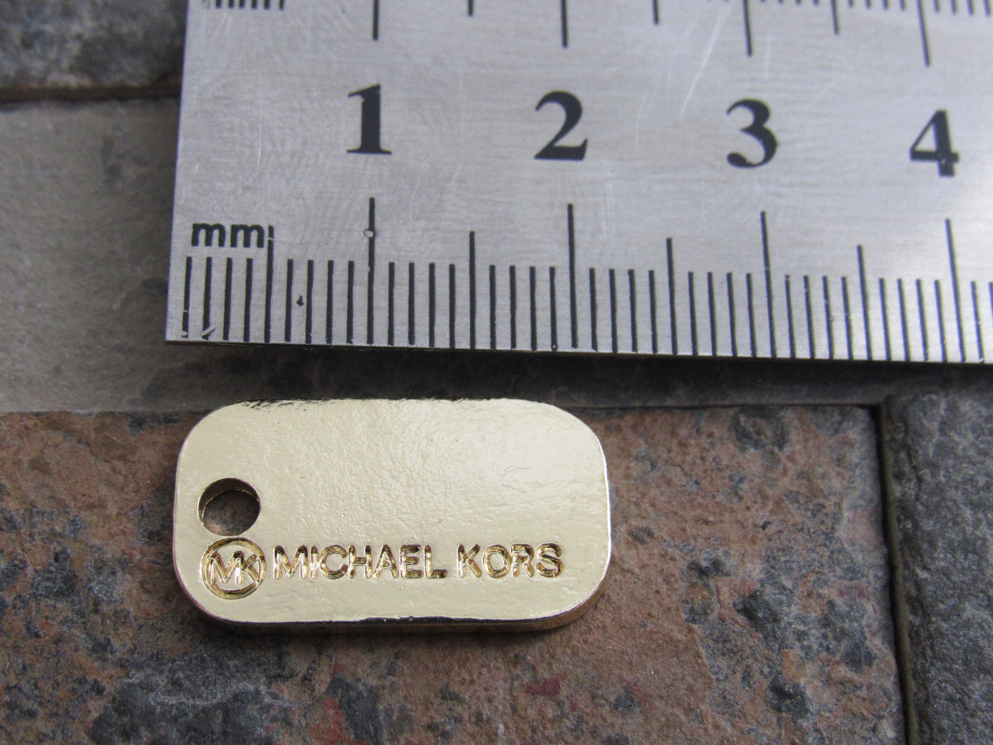 MK Michael Kors Gold Tone Dog Tag Charm!