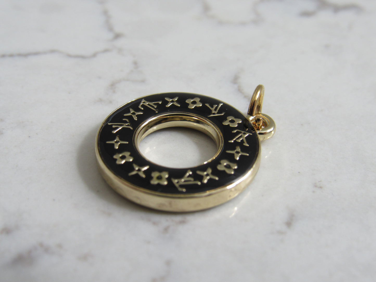 Louis Vuitton LV Black And Gold Tone Scripted Oval Zipper Pull Charm!