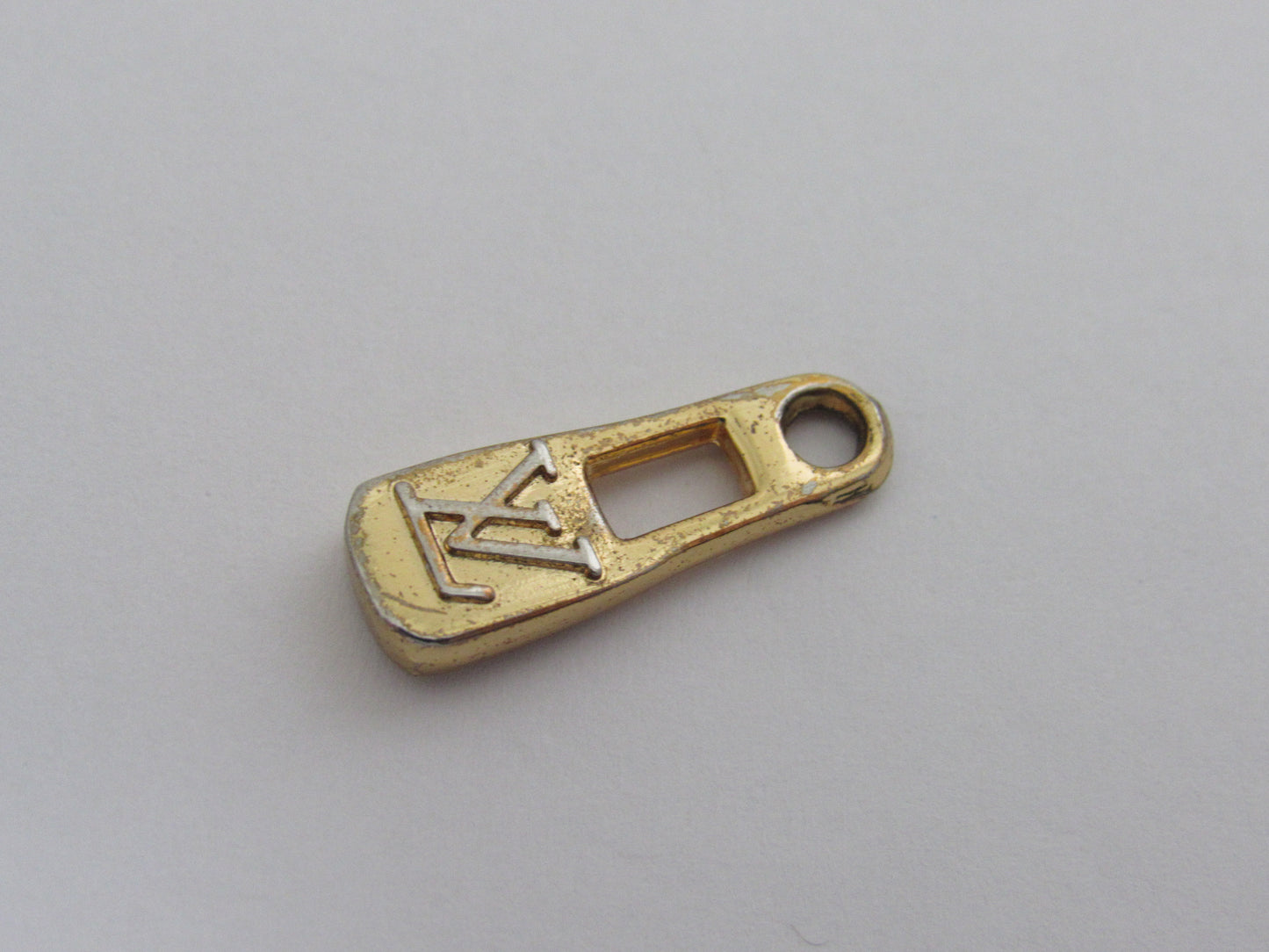 Vintage Louis Vuitton Gold Tone Embossed Bottle Cap Zipper!