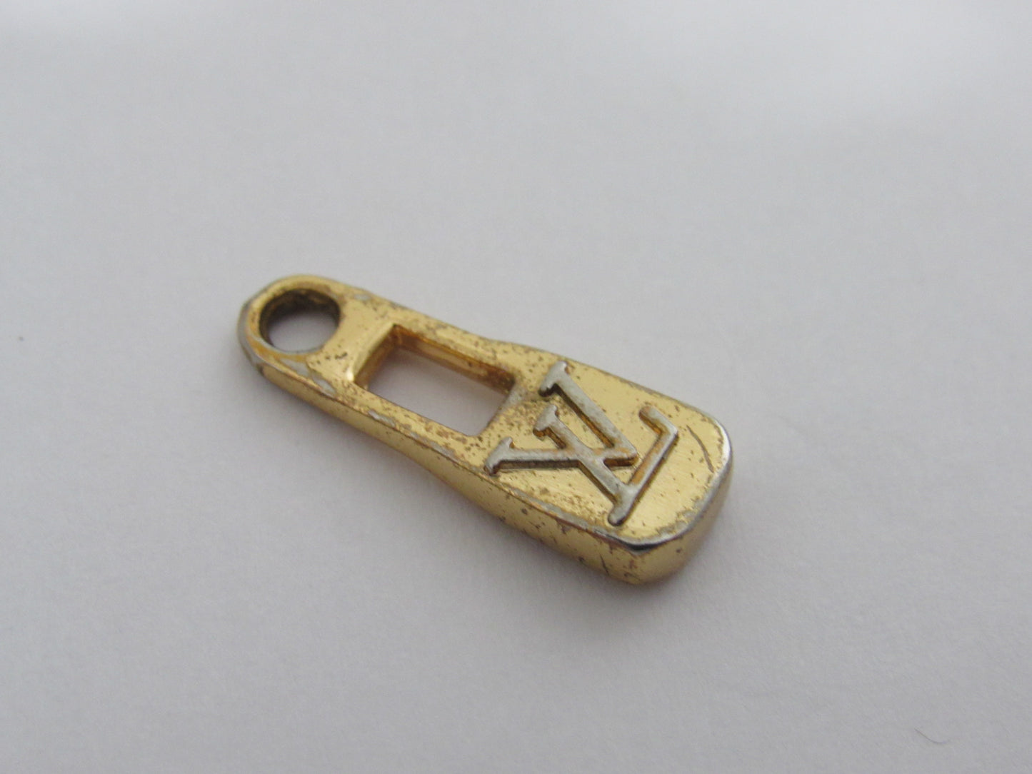 Vintage Louis Vuitton Gold Tone Embossed Bottle Cap Zipper!