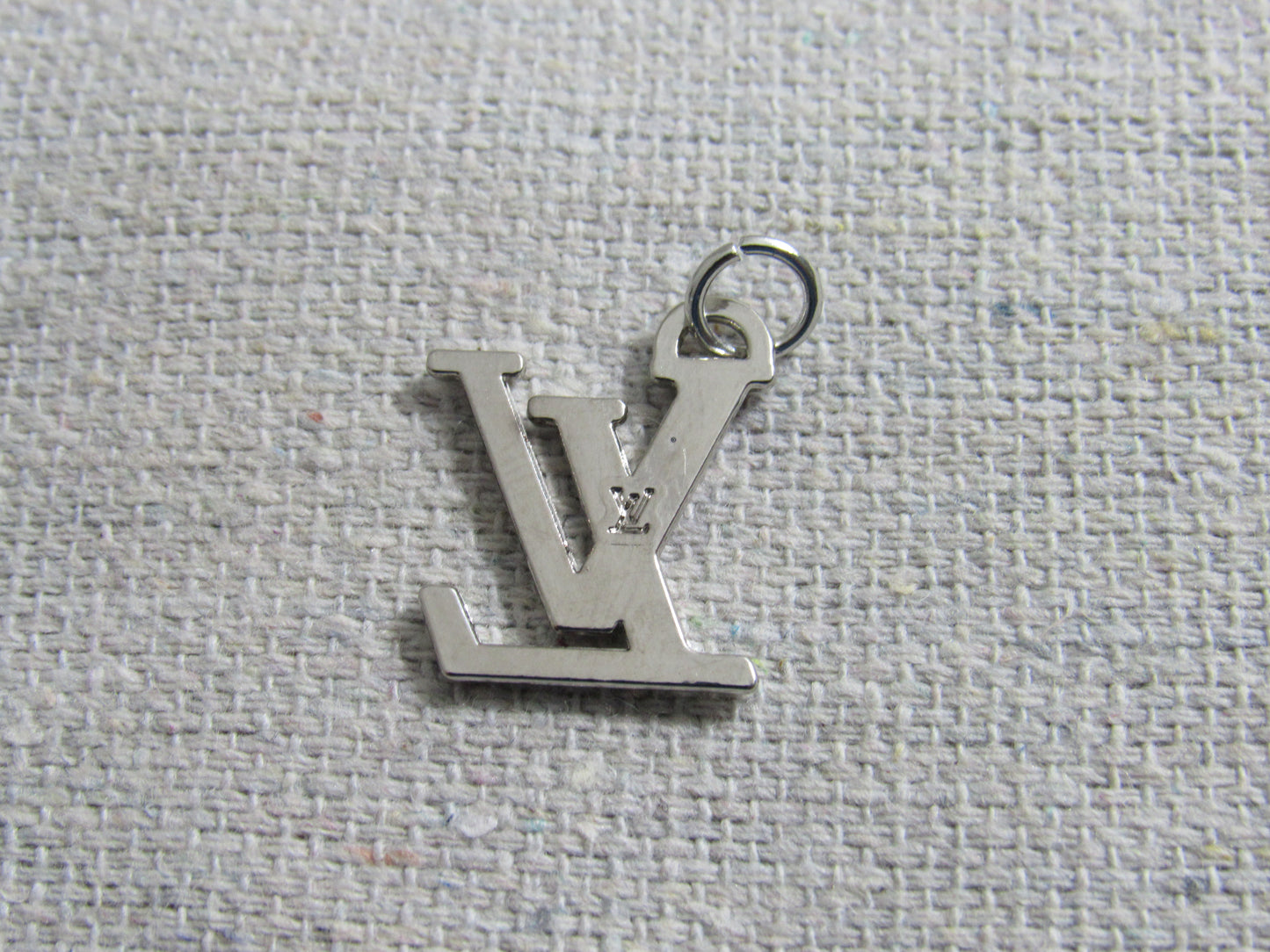 Louis Vuitton Silver Tone Stamped Zipper Pull Charm!