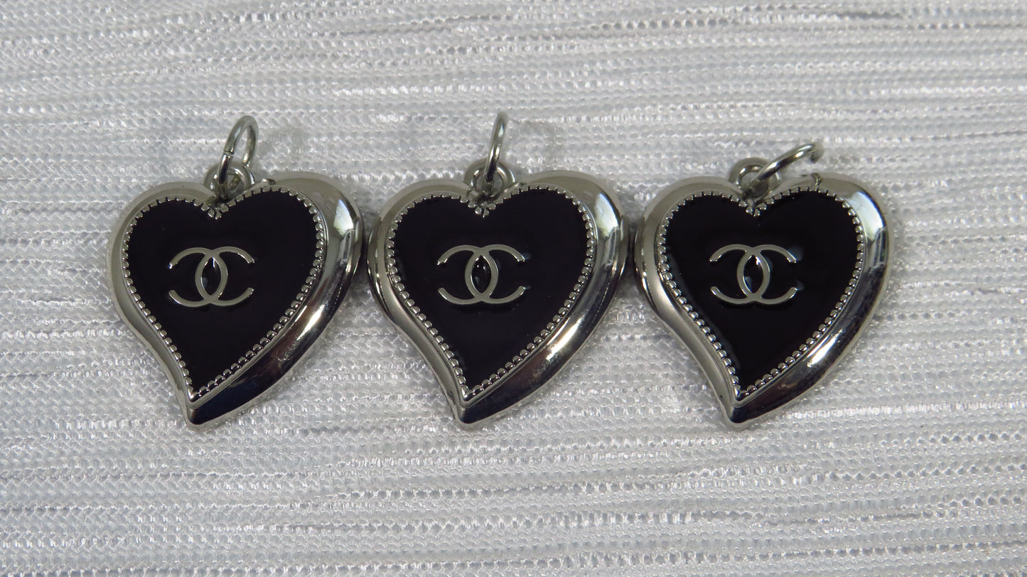 Value bundle of 3 Chanel Black And Chrome Abstract Heart Charms Stamped!