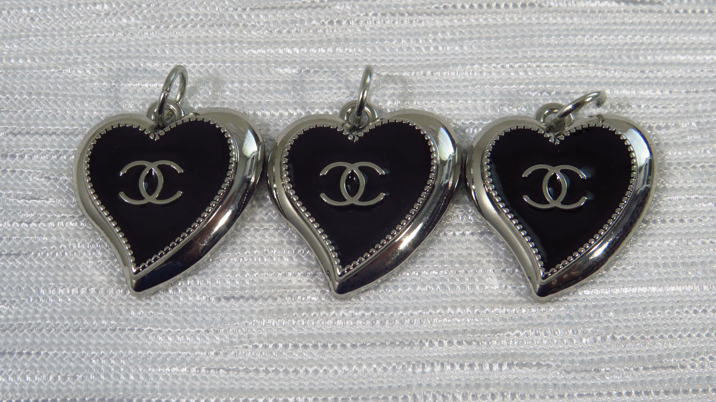 Value bundle of 3 Chanel Black And Chrome Abstract Heart Charms Stamped!