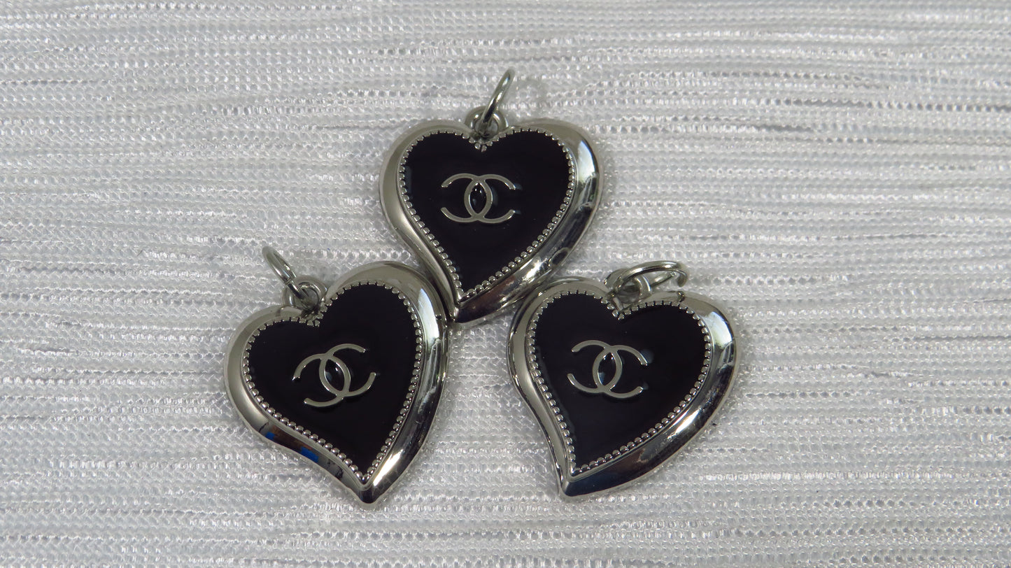 Value bundle of 3 Chanel Black And Chrome Abstract Heart Charms Stamped!