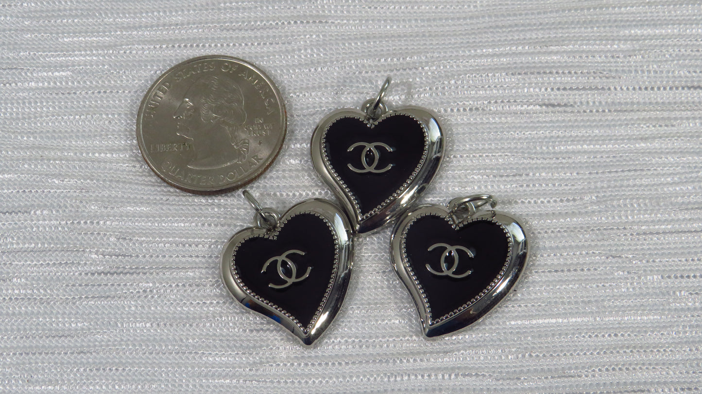 Value bundle of 3 Chanel Black And Chrome Abstract Heart Charms Stamped!