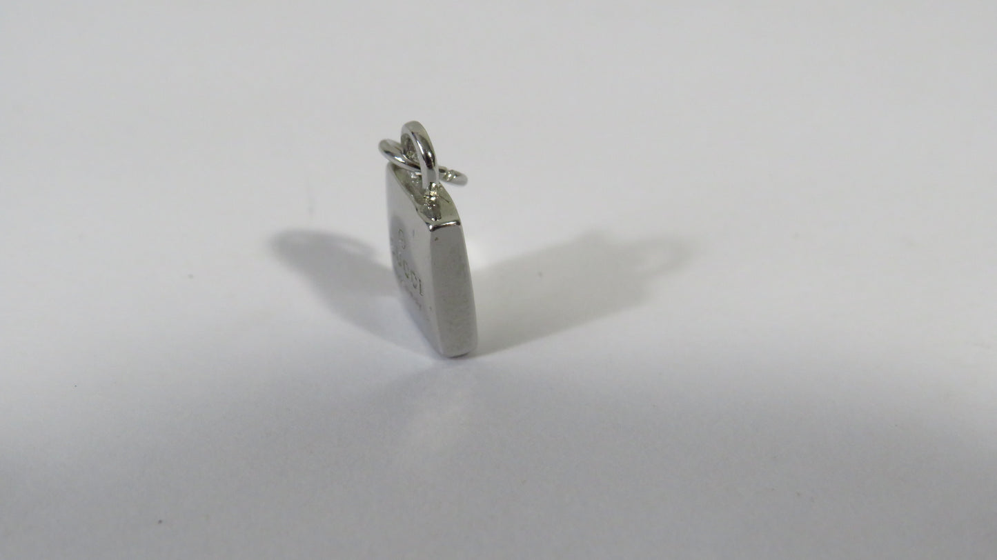 Silver pendant on a white background