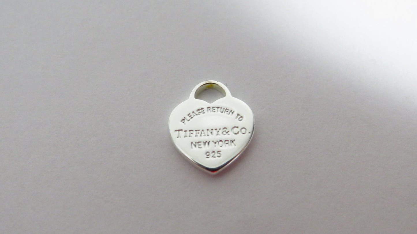 Tiffany And Co. Tiny Sterling Engraved Heart Charm!
