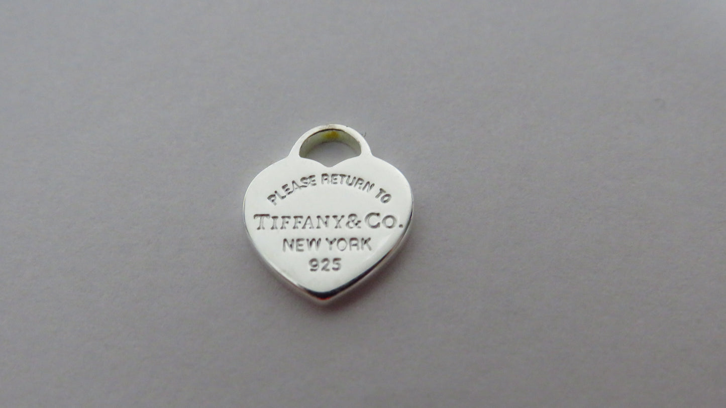Tiffany And Co. Tiny Sterling Engraved Heart Charm!
