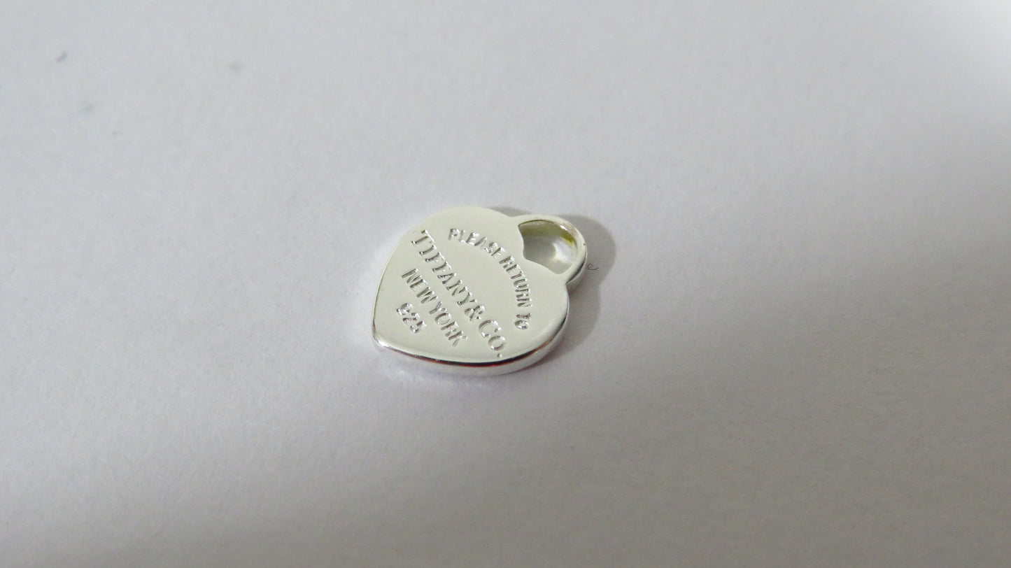 Tiffany And Co. Tiny Sterling Engraved Heart Charm!