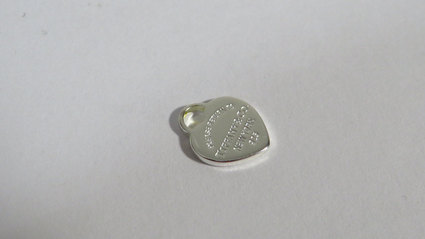 Tiffany And Co. Tiny Sterling Engraved Heart Charm!