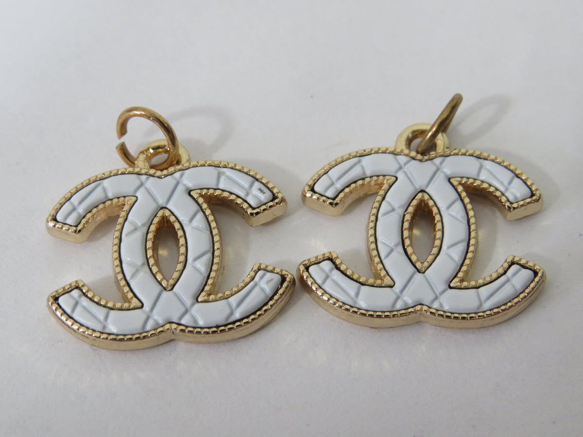 Bundle Of 2 Chanel CC White And Gold Stamped Zipper Pulls!