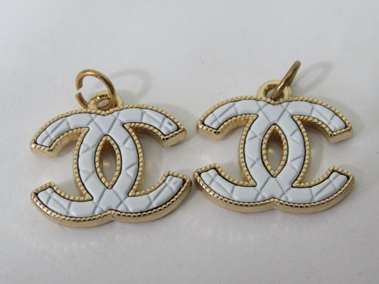 Bundle Of 2 Chanel CC White And Gold Stamped Zipper Pulls!