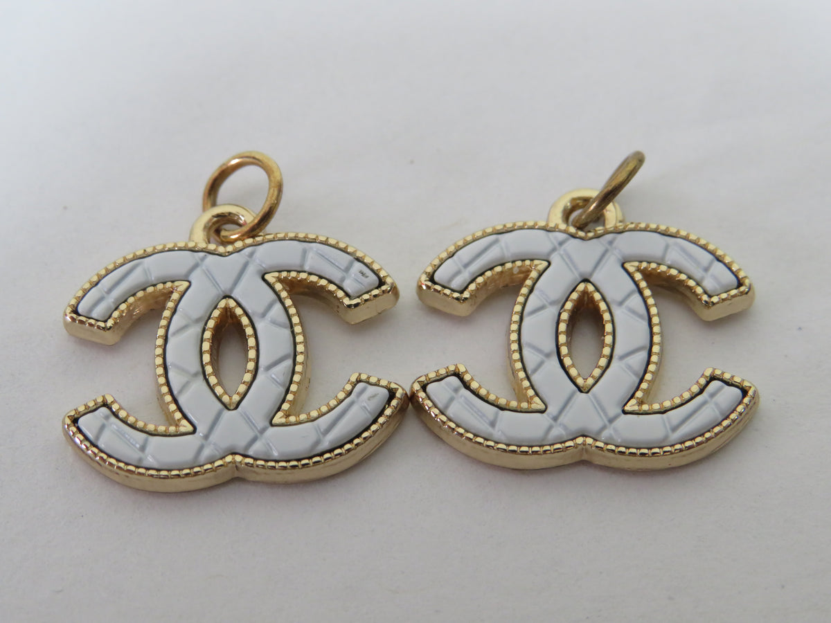 Bundle Of 2 Chanel CC White And Gold Stamped Zipper Pulls!