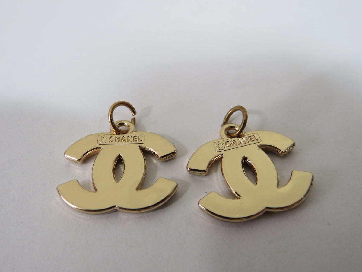 Bundle Of 2 Chanel CC White And Gold Stamped Zipper Pulls!