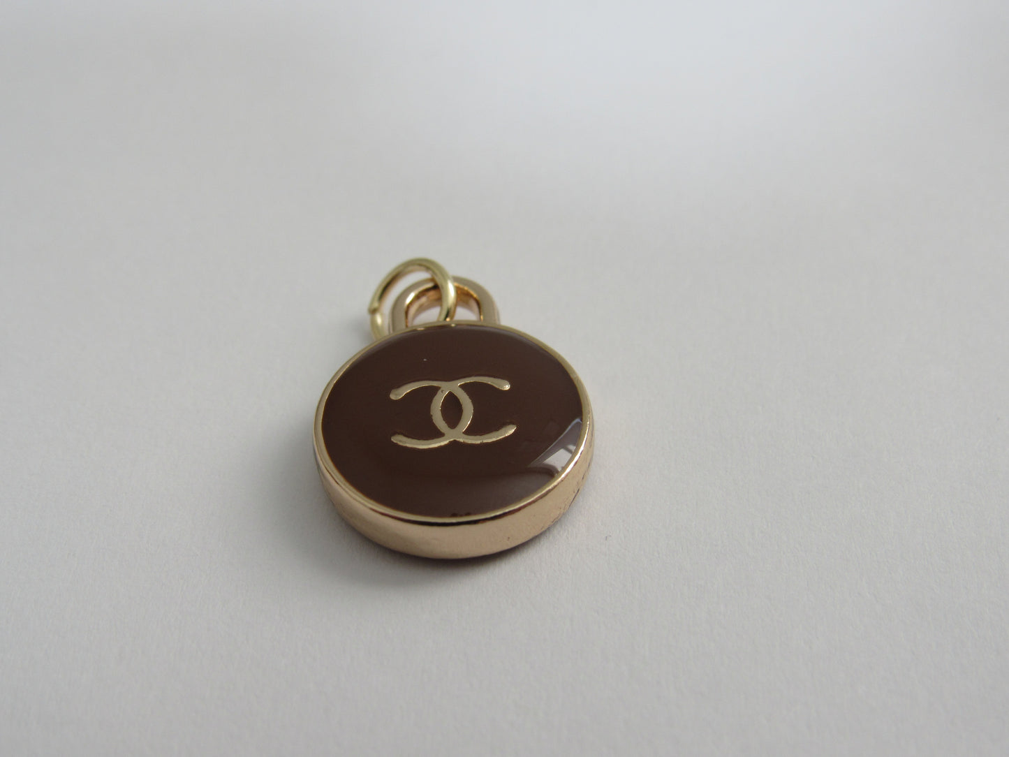 Chanel Brown And Gold Oval Enamel Double Sided Zipper Pull Charm!