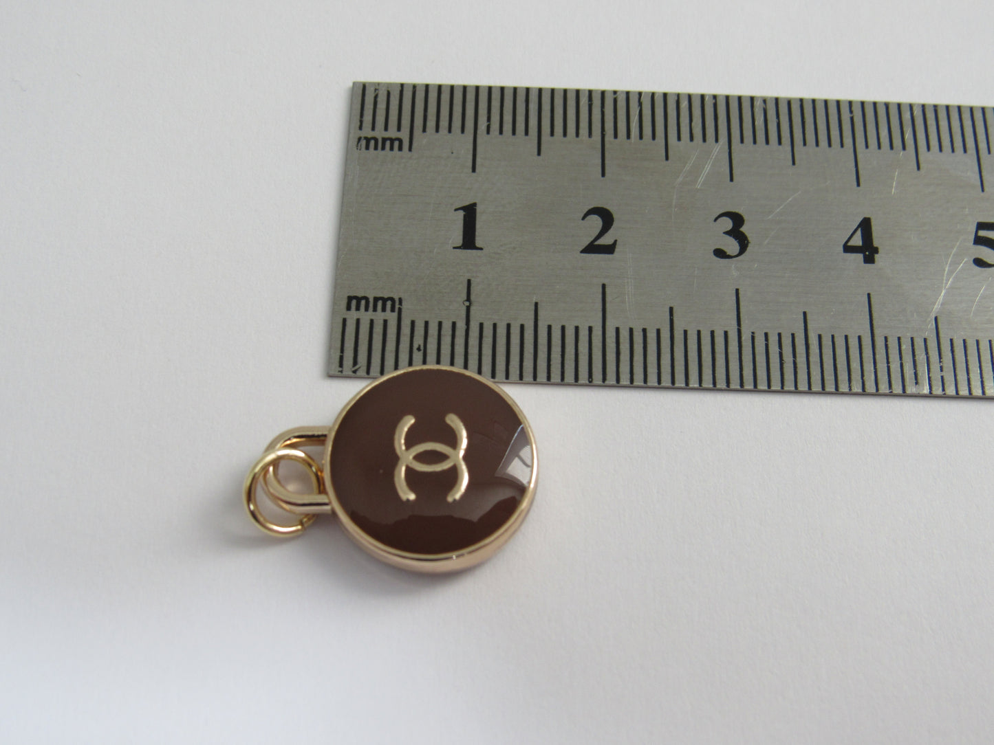 Chanel Brown And Gold Oval Enamel Double Sided Zipper Pull Charm!